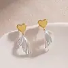 Brincos de Peixe Cauda de Amor Cor Contrastante Dourado e Prata Design de Nicho Personalidade Versátil Temperamento Brincos Estilo Frio Brincos para Mulheres