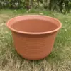 Suporte de flores de ferro circular suspenso para varanda, vaso de flores de ferro montado na parede, cesto suspenso anti-roubo para grade de janela, cesto suspenso na parede para exterior