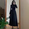 Vestido de Punto Plegado de Manga Larga Negro para Otoño e Invierno Estilo Nuevo Elegante Talla Grande Ropa Interior para Mujer Cintura ceñida Falda Larga de Corte A