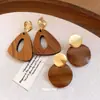 Novos Brincos Studs Geométricos de Madeira com Pino de Prata Retro Chinês Brincos Modernos Versáteis Ornamentos de Orelha de Luxo Leve High-End Atacado