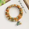 Pulsera de raíz de Bodhi de jade blanco natural, vaina de loto de boj, nueva chinería, material antiguo versátil, cuentas budistas Wenwan, suministro en vivo