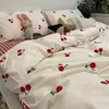 Conjunto de cama minimalista estilo Nantong de quatro peças, adequado para todas as estações, feito de algodão com estampa reativa