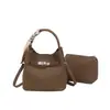 Bolsa Kelly com Grão de Lichia Feminina 2026 Outono/Inverno Nova Bolsa de Ombro Única de Alto Padrão Bolsa Saco Versátil para o Dia a Dia de Alto Padrão
