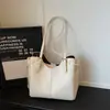 Bolsa de Ombro Estilo Retrô de Alta Qualidade Transfronteiriça para Mulheres 2025 Nova Versátil Grande Capacidade Bolsa Tote Simples para o Dia a Dia