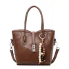 Bolsa de Mão Versátil Estilo Coreano Retrô Bolsa Saco para Mulheres Nova Coleção Primavera 2026 Nicho Luxo Leve Casual Ombro Transversal