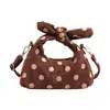 Bolsa de mão super popular de bolinhas para mulheres, novo estilo coreano 2026, versátil e estilosa, bolsa de ombro e transversal para o dia a dia e viagens