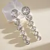 Pendientes colgantes de rombos con borlas tachonados de diamantes de aguja de plata transfronterizos europeos y americanos, pendientes exquisitos y de moda, pendientes versátiles y elegantes al por mayor