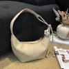 Bolso tipo dumpling simple casual estilo perezoso modelo nuevo 2026 transfronterizo para mujer, bolso de hombro y bandolera versátil simple de alta gama