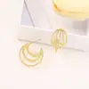 Brincos circulares em cruz de várias camadas geométricos vazados irregulares de venda quente transfronteiriça brincos de moda retrô vento frio