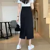 Falda Negra de Media Longitud para Mujer Otoño Falda Larga Línea A 2026 Nuevo Estilo Falda Elegante de Cintura Alta para Figuras Pequeñas Diseño con Abertura Trasera