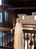 2026 Nova Blusa Estampada de Borboletas com Estilo de Saia Longa, Cor Sólida Gola Halter Feminina Caimento Regular Sem Mangas Conjunto de Duas Peças