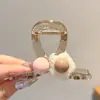 Atacado de acessórios de cabelo Dongdaemun Coreia: Grampos de cabelo da nuca da moda para mulheres, presilhas tubarão de alta qualidade e requintadas