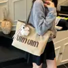 Bolsa de Lona de Ombro Único para Estudante Universitário Bolsa Grande Feminina Grande Capacidade 2025 Nova Bolsa Tote de Aparência Elegante para o Dia a Dia