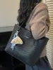 Bolso de color liso muy elegante de gran capacidad, nuevo modelo de verano 2026, bolso de hombro retro simple y chic, bolsa de mano para el trabajo