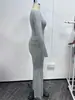Novo conjunto de outono/inverno europeu e americano, transfronteiriço, sexy, sem costas, gola redonda, caimento justo, com mangas compridas e punhos, calça casual confortável