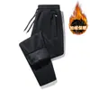 Calça de Moletom Esportiva Masculina de Algodão Puro com Veludo Interno para o Inverno de 2025, Solta, com Punhos, Calça Casual Versátil com Zíper Masculina