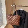 Bolsos tote de alta calidad al por mayor para mujer, nueva colección otoño 2026, bolsos de hombro de color liso con estampado de diamantes, adecuados para el trabajo y el uso diario