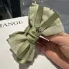 Primavera 2025 Nuevo Diseñador de Corea del Sur Hilo Material Lazo Pasador de Pelo Flor Pequeña Pinza de Plátano Disco para Parte Trasera de la Cabeza Pasador de Pelo