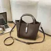 Bolso Vintage de Nicho para Mujer, Nuevo Modelo 2026, Bolso Cubo Simple con Patrón de Lichi, Bolso Cruzado Versátil de Moda