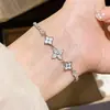 Pulsera de flor de circonita y nácar chapada en oro real de 18k, pulsera de estilo coreano ins de alta gama, joyería versátil de lujo ligero para mujer