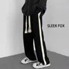 Calças casuais pretas para homens, calças de moletom retas soltas da moda, novas calças compridas versáteis da moda estilo Hong Kong para outono e inverno