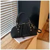Bolsa de Mão Feminina Lisa Cor Sólida Nova Tendência Fashionável Bolsa Feminina Elegante Temperamento Design de Nicho Bolsa de Ombro Único Transversal
