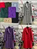 Outono e inverno de 2023 Nova roupa feminina europeia e americana Amazon Simples cor sólida lapela de botões manga longa casaco de lã