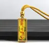 Venta al por mayor del fabricante Arena Mineral Pintada a Mano Acero de Titanio Thangka Zaki Lamu Amarillo Riqueza Mineral Pequeño Thangka Portátil Buda Amuleto Colgante Collar