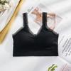 Venta al por mayor, top deportivo con espalda de encaje sin aros y tubo envolvente para el pecho, ropa interior sin costuras antiexposición para yoga para mujer