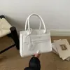 Bolsa de Mão Moda Retrô Padrão Pedra Embossado Ombro Único Feminina 2026 Novo Estilo Transfronteiriça Cor Sólida Textura Transversal Feminina