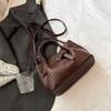 Bolso Tejido de Patrón de Nicho para Mujer 2026 Nueva Moda de Verano Versátil Textura de Alta Calidad Bolso Cruzado Estilo Cesta
