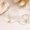 Elegante pulsera y anillo de trébol de cuatro hojas con diamantes estilo francés, exquisito accesorio de mano versátil y elegante para mujer