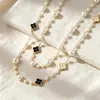 Elegante collar largo de perlas estilo coreano para mujer, versátil para otoño e invierno, exquisita cadena para suéter, colgante de letra simple y único, venta al por mayor