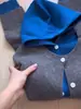 Cárdigan de punto con capucha gris estilo francés de dos piezas falsas para mujer, prenda exterior de principios de otoño con un toque de alta gama, abrigo holgado suave y mullido