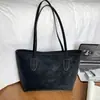 Bolsa de Mano Tote Lisa Color Sólido Estilo Coreano 2026 Otoño Nuevo Bolso de Hombro de Gran Capacidad Bolsa Versátil para Mujer Tendencia al por Mayor