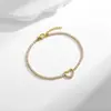 Pulseira Popular de Titânio Aço Amor Cruzada Inlaid com Joias de Zircônia para Mulheres, Conjunto de Joias Versátil de Alto Padrão em Forma de Coração Gypsophila