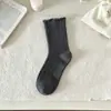 Calcetines retro estilo japonés para mujer, nueva colección de otoño, calcetines de punto trenzado de doble aguja hasta la pantorrilla, calcetines de encaje apilados simples y versátiles estilo coreano
