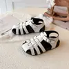 Novedades Verano 2026 Unisex Moda Infantil Sandalias Cubrepie Estilo Coreano Moda Zapatos de Playa Suela Blanda Venta al por Mayor Individual Artículo Popular