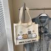 Bolsa Estampada de Desenho Animado Coreano Transfronteiriça para Mulheres 2025 Nova Bolsa de Lona Versátil para Estudantes Bolsa Tote de Ombro de Grande Capacidade