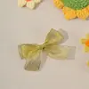 Exclusivo novo acessório de cabelo para bebê estilo coreano e japonês, totalmente coberto de tecido, não danifica o cabelo, presilha lateral de laço para franja de meninas, ornamento de cabelo