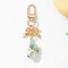 Llavero colgante de mariposa de cristal fresco y simple para niñas y mejores amigas, accesorio de bolso con lazo minimalista, lujo ligero, dulce y de alta gama