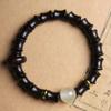 Ébano bambú DIY para siempre noche pulsera joyería fabricantes mayoreo especificaciones 0.8 rosario para hombres y mujeres adornos pulsera