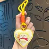 Nuevo Llavero de Cuero Sanrio Corazón Colgante para Bolso con Acabado de Alta Gama, Cuerda Trenzada Dibujo Animado Adorno Exquisito, Pequeño Regalo