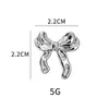 Pendientes de lazo dorado transfronterizos europeos y americanos, elegantes y modernos, con un diseño de alta gama y único, hechos de metal