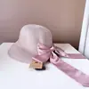 Corrente de contas japonesa fita de laço Chapéu de palha de pescador feminino verão elegante versátil proteção solar chapéu de bacia chapéu de praia para férias moda