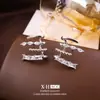 Pendientes de línea de circón geométrico de moda europea y americana, pendientes de diseño minimalista de personalidad nicho, pendientes de lujo ligero de alta gama