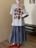 Saia midi xadrez de alta qualidade com acessório de cabelo 2026 Nova Coleção Primavera Estilo Coreano Casual Temperamento Cintura Alta Emagrecedora Saia Longa