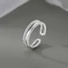 Anillo de doble capa para mujer, anillo abierto, lujo ligero, diseño de nicho, alta gama, banda simple, anillo ajustable para el dedo índice, venta al por mayor
