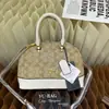 Bolso de Mano con Forma de Concha Vintage 2026 Nueva Moda Versátil Hombro Cruzado Marca de Nicho Monograma Alto Gama Transfronterizo