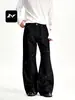 Pantalones casuales de pierna ancha, diseño dividido deconstruido, corte holgado y limpio, en rico estilo callejero americano, mezclilla negra para hombres y mujeres